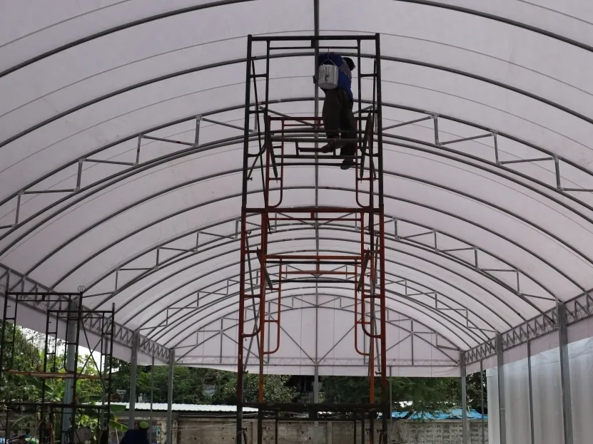 รับเปลี่ยนผ้าใบเต็นท์โกดัง / เต็นท์โรงงาน ซ่อมแซมและบำรุงรักษา